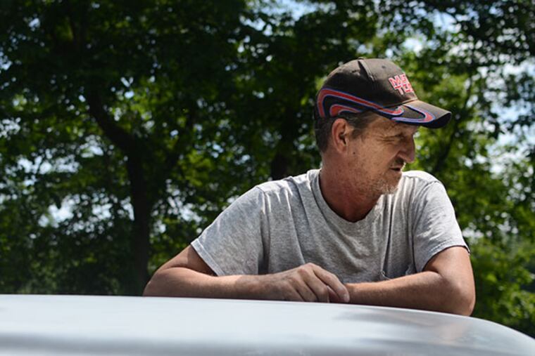 Michael Moore stands at the location where he found Sandy Stiver's body in 1968 when he was 14 years old.