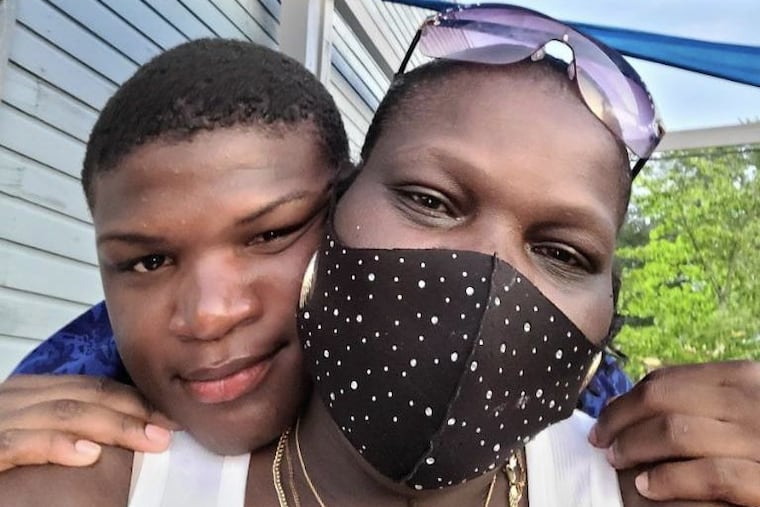 Devin Weedon hugging his mother, Wytina Burnside.