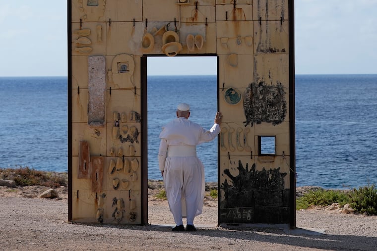 Pope Leo XIV visits the Gateway of Europe monument in Lampedusa, Sicily on July 4, during a one-day visit to the island long associated with the plight of migrants crossing the Mediterranean.