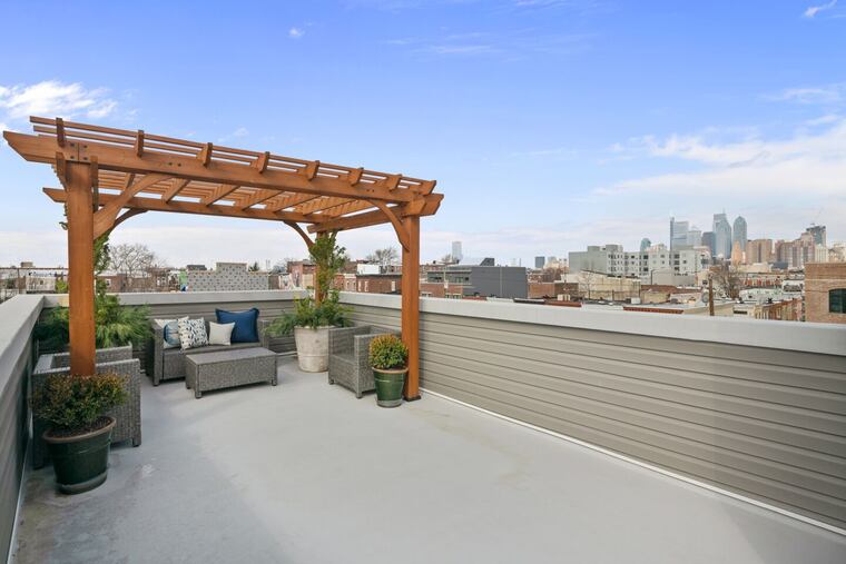 A roof deck has been added to 1405 S. Clarion St., an updated rowhouse in South Philadelphia.