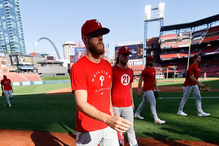 Phillies pitcher Zack Wheeler, the starter for Game 1 on Friday, walks off the field after workouts at Busch Stadium on Thursday.