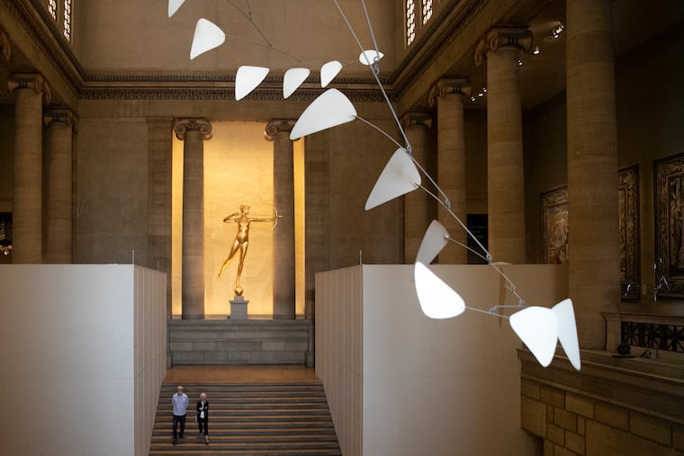 Visitors wear face masks as they walk down the grand staircase of the Philadelphia Museum of Art on Thursday, Sept. 03, 2020. The museum reopened Thursday morning to members only after being closed due to the coronavirus. It will be open to the general public on Sunday.