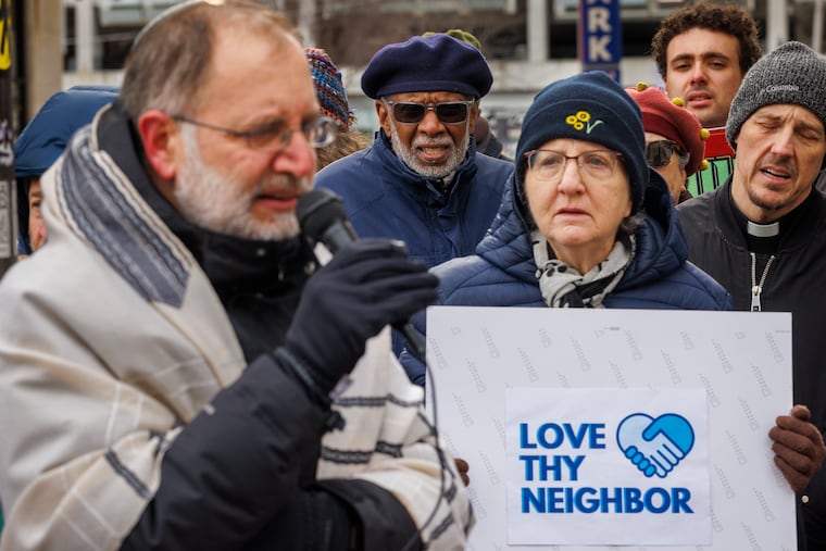 Center is Art Haywood, Pennsylvania State Senator, 4th District participates in the Interfaith religious and community leaders prayer vigil outside the Philadelphia office U.S. Immigration and Customs Enforcement office at 114 N. 8th Street in Center City, Monday, March 2, 2026.