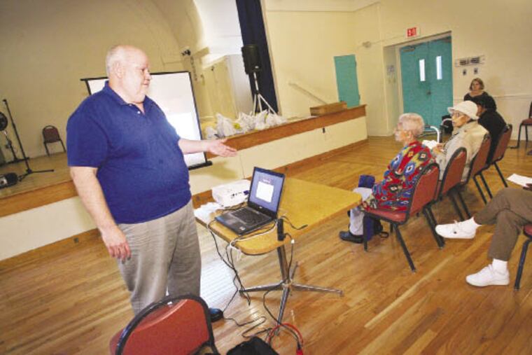 Jerry Bennett of the Energy Coordinating Agency teaches money-saving conservation tricks at workshops around the city. (Alejandro A. Alvarez / Staff Photographer)