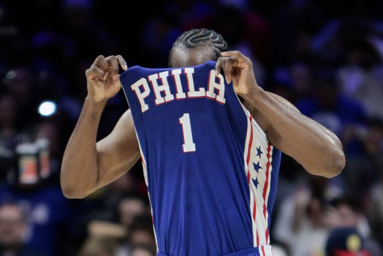 Sixers James Harden pulls up his jersey after missing a shot in the final seconds against the Heat.