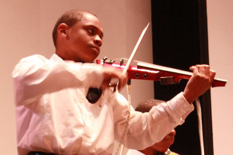 Max Chambers, 13, of Berwyn gets help from the Marian Anderson Young Artist Study Grant.