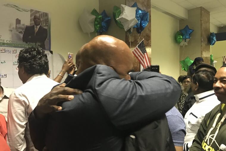 Atlantic City Councilman Frank M. Gilliam Jr. hugs a supporter after watching his rival City Council President Marty Small apparently concede the Democratic mayoral primary via Facebook.