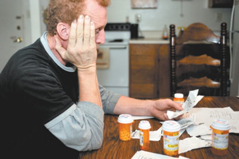 Casino ATM receipts and medicine cover Scott Jones’ table in Barrington. He says casinos welcomed him even after he joined the state’s self-exclusion list. (Sharon Gekoski-Kimmel / Staff Photographer)