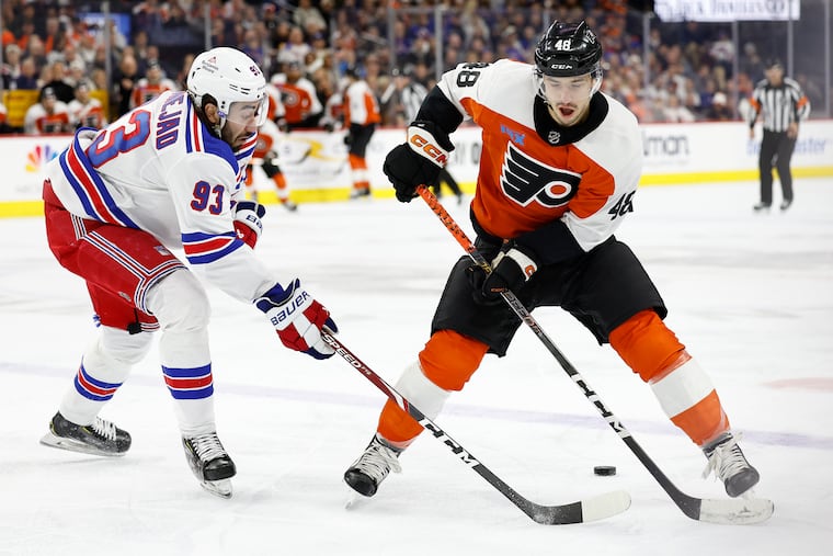 Morgan Frost (right) and the Flyers will face Mika Zibanejad and the New York Rangers two more times in the regular season.