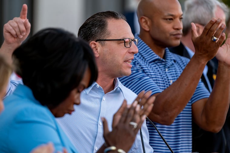 Pennsylvania Gov. Josh Shapiro (center) attends a Harris/Walz campaign event at the Laborer's Training Center in North Philadelphia Oct. 6, 2024, with Gov. Wes Moore of Maryland (right) and Philadelphia Mayor Cherelle L. Parker (left).
