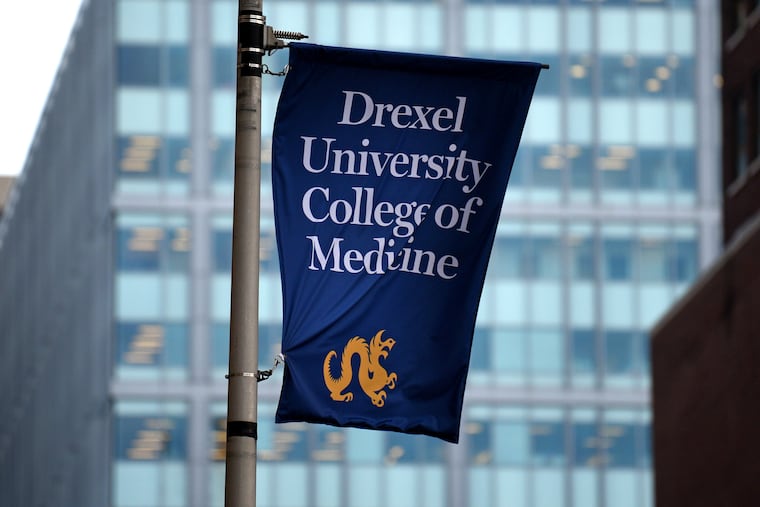 A banner at the entrance to Drexel University College of Medicine.