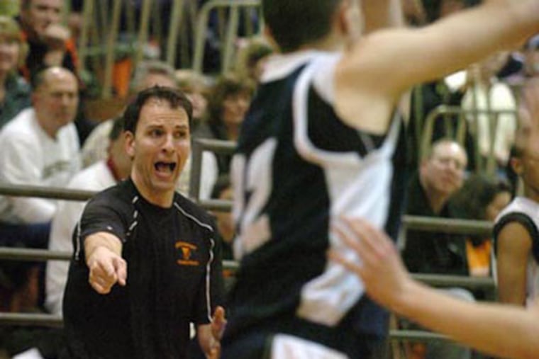 Frank Sciolla, then the Pennsbury boys' team coach, shouts directions to his players. Now the Pennsbury girls coach, he will face his former player, Zach Sibel, in Saturday's District 1 title game.