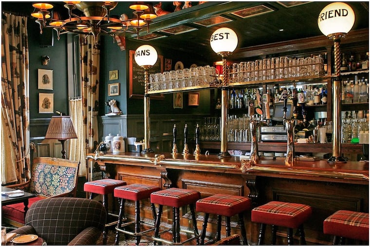 The bar at The Dandelion is the perfect spot for a festive holiday drink with friends.