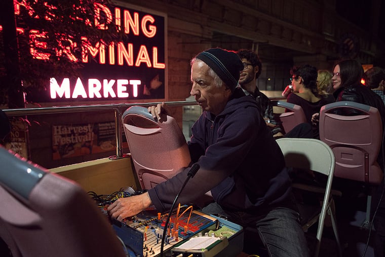Charles Cohen on a synthesizer on a tour bus in October 2013, the first year of the event. Subsequent series went much better. SCOTT TROYAN