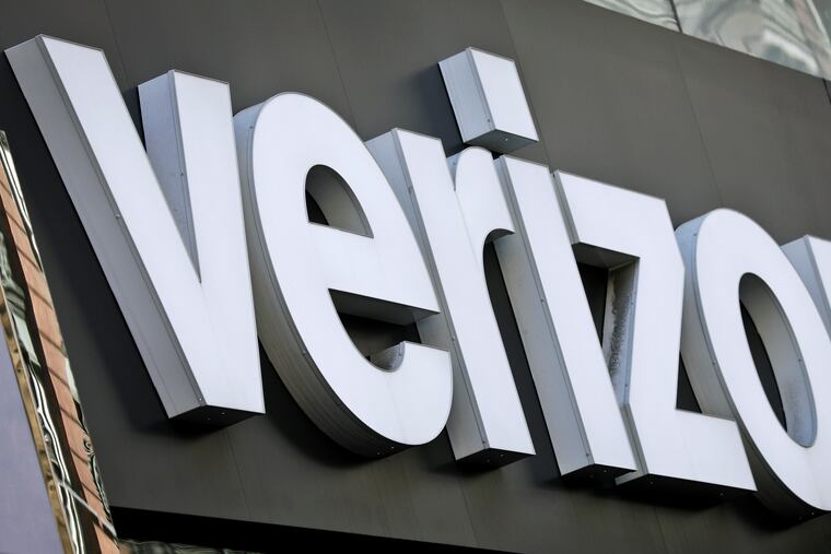 FILE photo shows Verizon corporate signage on a store in New York's Midtown.