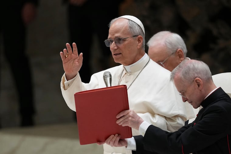 Pope Leo XIV meets members of the international media in the Paul VI Hall at the Vatican on May 13.