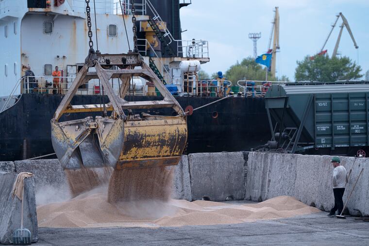 Workers load grain at a port in Izmail, Ukraine, last month.
