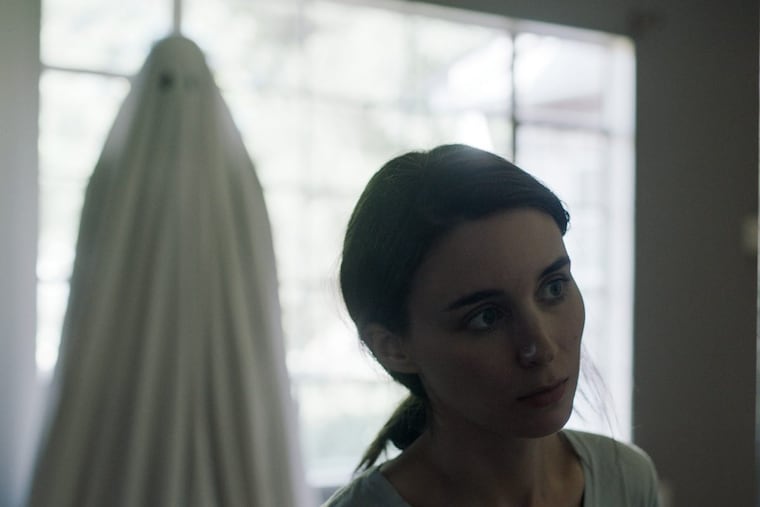 “A Ghost Story”: A recently deceased man (Casey Affleck) returns to his home as a white-sheeted ghost to try to reconnect with his bereft wife (Rooney Mara).