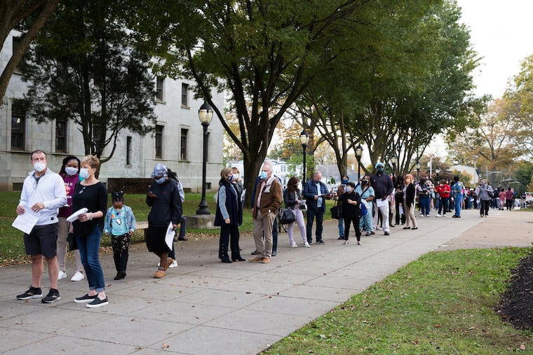 Hundreds of people waited in line earlier this week outside a Delaware County Bureau of Elections Voter Service Center in Media, Pa.