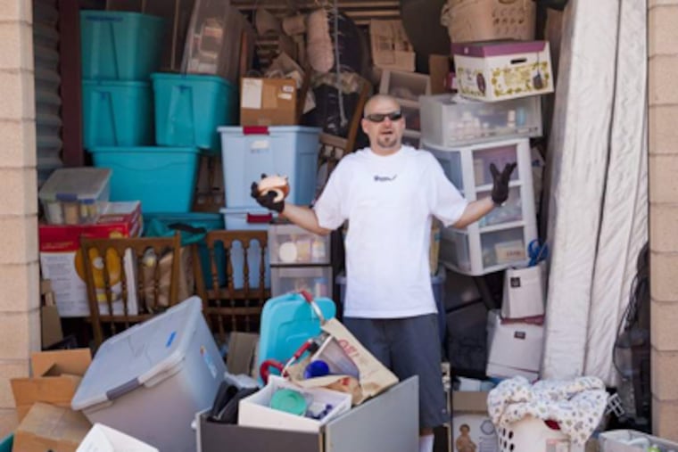 Jarrod Schultz appears in "Storage Wars," one of the shows that illustrate the excesses of our society — so much consumerism that some people can't manage all of their stuff. STUART PETTICAN