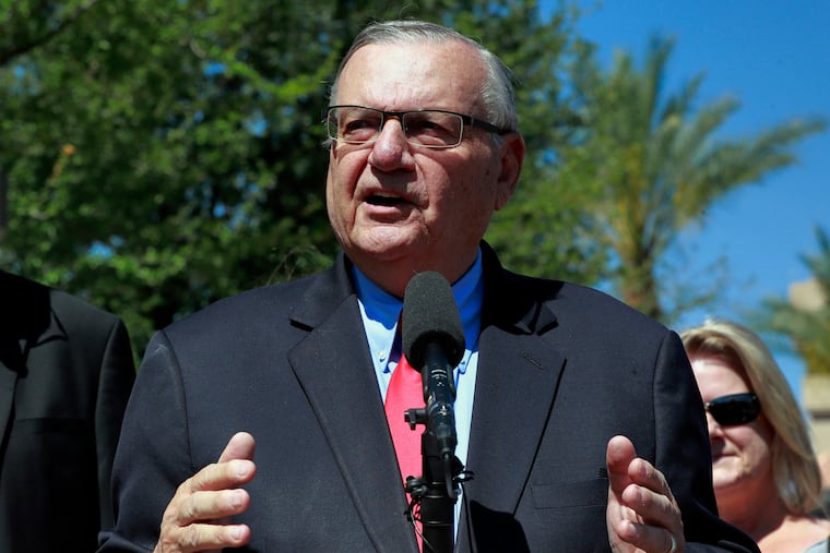 FILE _ In this May 22, 2018, file photo, former Maricopa County Sheriff Joe Arpaio speaks during a campaign event in Phoenix. Arpaio filed a defamation lawsuit against three news organizations on Monday, Dec. 10, alleging that their inaccurate references to his criminal case have hurt his chances in possibly running in 2020 for the Senate. (AP Photo/Matt York, File)