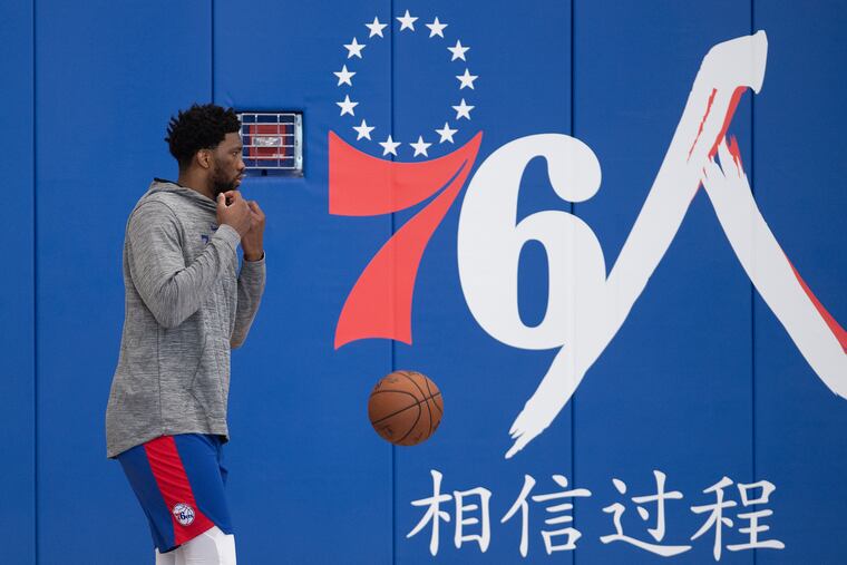 Joel Embiid gets ready for practice at the 76ers practice complex in Camden on Wednesday..