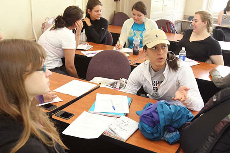 West Chester University's Paige Elliott is among 350 students in professor Anita Foeman's DNA Discussion Project, a course that takes a scientific look at each student's genetic makeup.