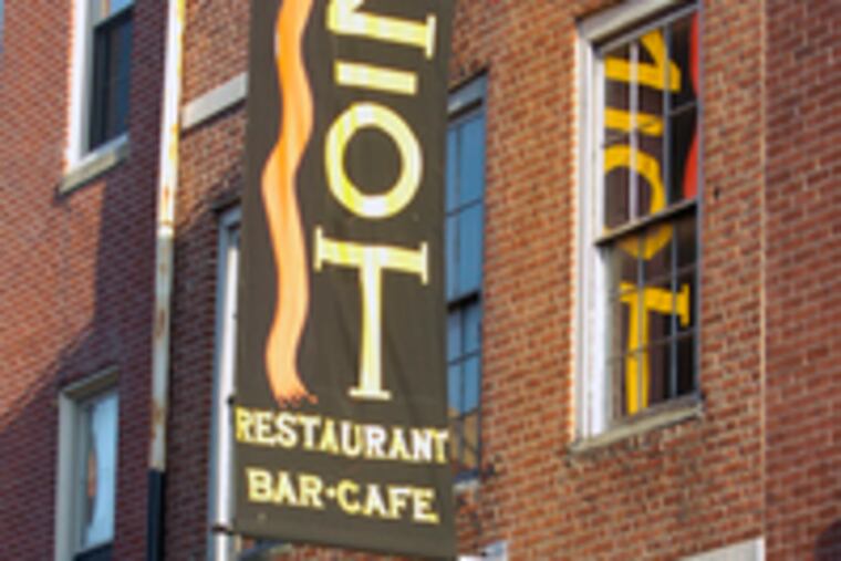 ZoT, ("zany" in Flemish) has upscale menu, with a spreadsheet look.