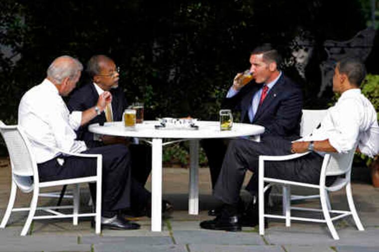 President Obama and Vice President Biden joined Henry Louis Gates Jr. (second from left) and Police Sgt. James Crowley for a cold one on the White House South Lawn yesterday. Later, Crowley said he and Gates "agreed to disagree" about the confrontation that led to Gates' July 16 arrest. Story, photo, A2.