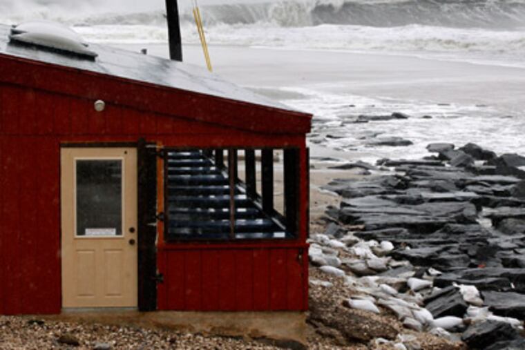 The dining area of The Cove restaurant in Cape May, N.J., is threatened by the rough Atlantic Ocean on Monday, as Hurricane Sandy continued toward landfall. (AP Photo/Mel Evans)