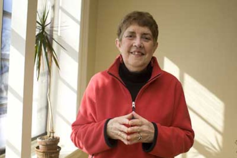 Cheryl Bayard, a breast cancer survivor, spends time volunteering at the Wellness Community in Lansdale. (Ed Hille / Staff Photographer)