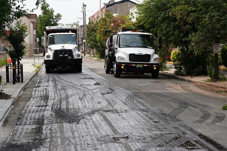 The Streets Department works at Sixth and Washington Streets in Philadelphia.