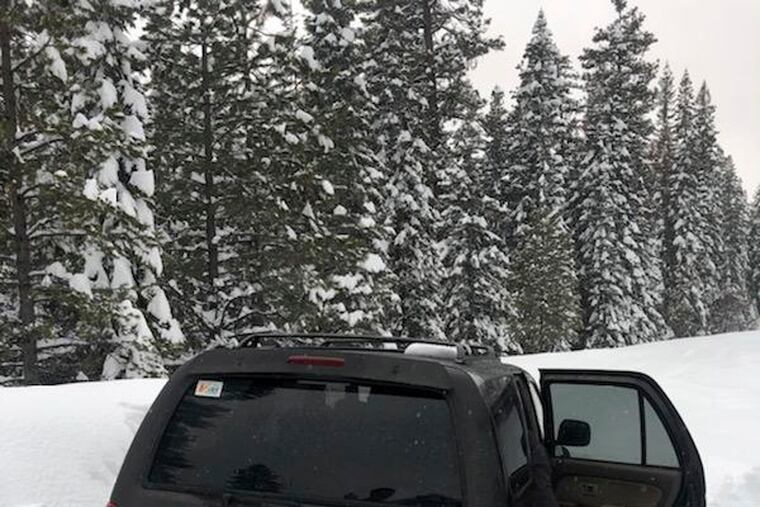 This photo released Saturday, March 2, 2019, by the Deschutes County Sheriff's Office, shows the scene where a man whose car was stranded in central Oregon snow for five days survived by eating taco sauce packets and starting the engine periodically to warm up near Bend, Ore. A snowmobiler found Jeremy Taylor, of Sunriver, on Friday, March 1, and a search and rescue team member who rode to him on a large snow tractor brought him out of the woods, said Sgt. William Bailey, the spokesman for the Deschutes County Sheriff's Office. He told his rescuers he and his dog, Ally, became stuck in deep snow on a U.S. Forest Service road. (Deschutes County Sheriff's Office via AP)