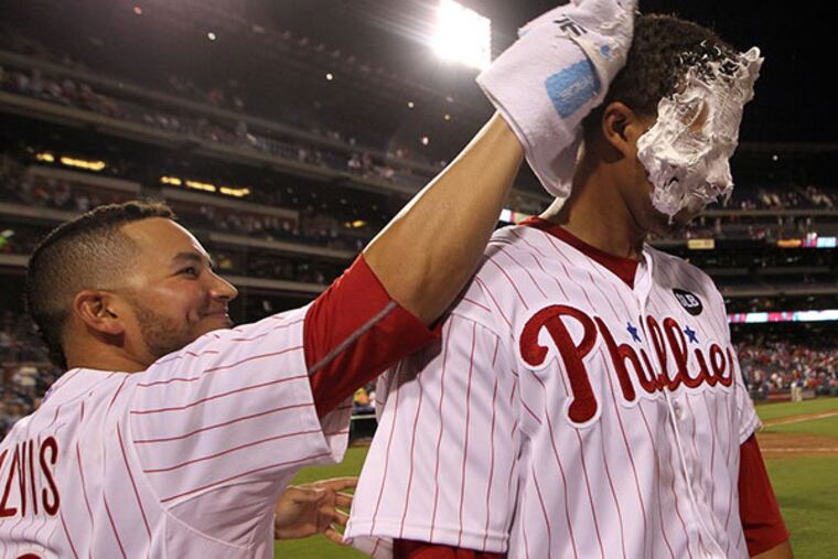 Phillies' Aaron Altherr gets a towel full of shaving cream from teammate Freddy Galvis.
