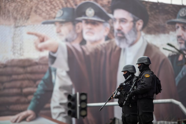 A billboard shows Iranian Supreme Leader Mojtaba Khamenei with military commanders in Tehran on Friday.