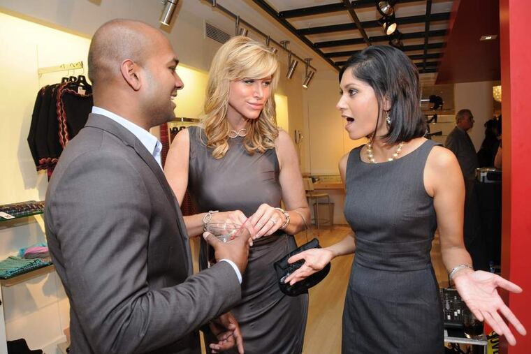 inqlings27 Photo: HUGHE DILLONTalking shop at the relaunch party for the Boyds store in Center City on Thursday 9/24, NBC10's Mac Francis chats with CBS3's Lesley Van Arsdall (center) and NBC10's Aditi Roy.