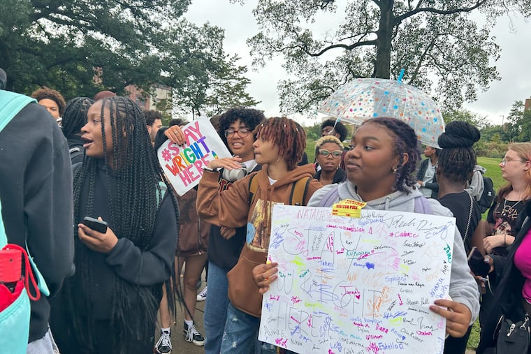More than 100 Central High students walked out of school Monday to protest the transfer of a school safety officer.