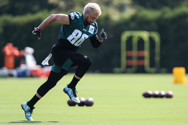 Philadelphia Eagles tight end Zach Ertz runs drills during the first day of training camp at the NovaCare Complex.