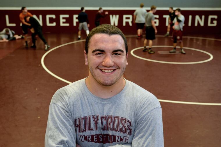 Holy Cross wrestler Matt Correnti went 43-1 as a junior with his only loss coming in the state final at 195 pounds. His single goal as a senior is to win the state title. At left: One of Correnti's wins last season came in nine seconds against Camden Catholic's Jake Stillings. Above: TOM GRALISH / StaffLeft: CURT HUDSON / For The Inquirer
