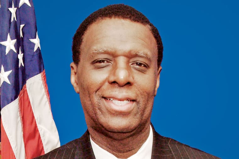 Gilbert “Whip” Wilson. State law prohibits him holding two elected offices.