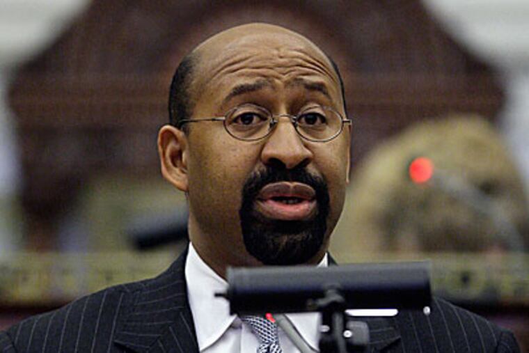 Mayor Michael Nutter delivers his budget proposal at City Hall in Philadelphia, Thursday, March 19, 2009. (AP Photo/Matt Rourke)
