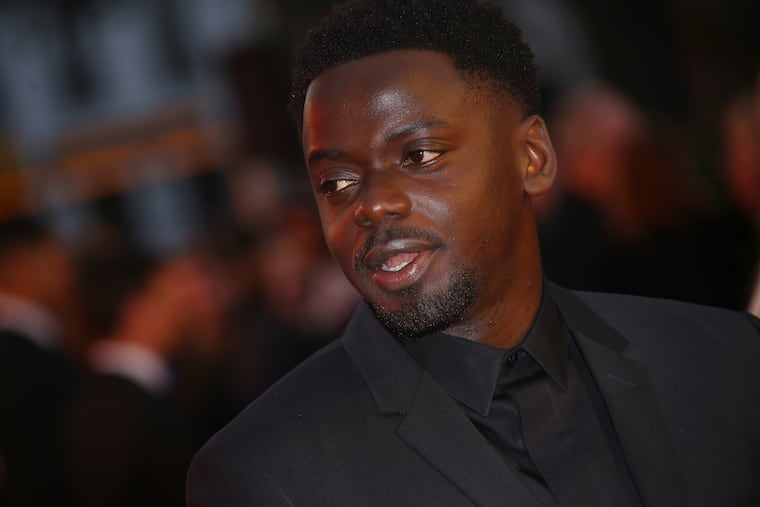 Actor Daniel Kaluuya poses for photographers upon arrival at the opening of the London Film Festival and the premiere of the film 'Widows' in London, Wednesday, Oct. 10, 2018.