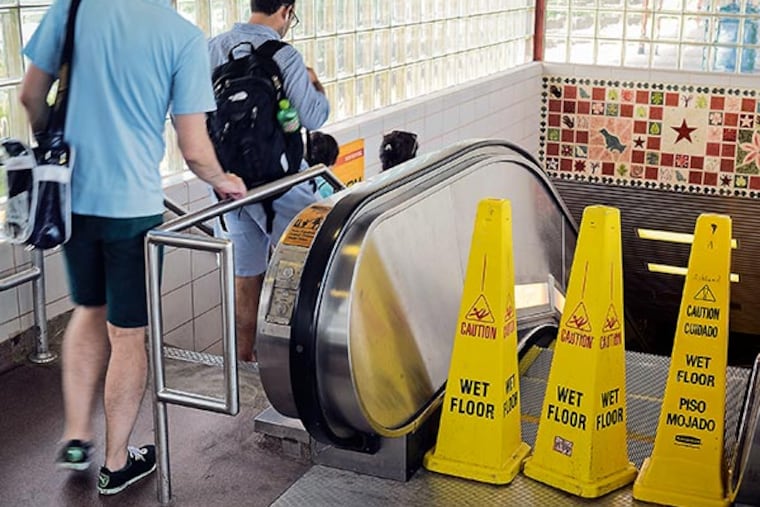The escalator is out of service at the PATCO Ashland station Friday, August 16, 2013, as riders face more stair-climbing and handicapped passengers encounter more obstacles. ( TOM GRALISH / Staff Photographer )