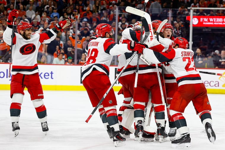 The Hurricanes celebrate an overtime victory over the Flyers in Game 4 of the second round of the NHL hockey Stanley Cup playoffs Saturday, May 9, 2026, in Philadelphia.