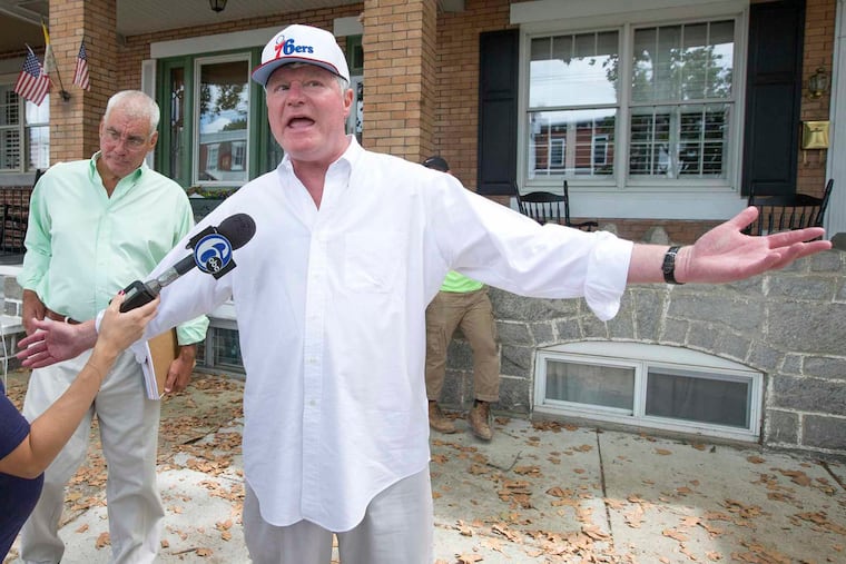 IBEW Local 98 union leader John J. Dougherty spoke to reporters as FBI agents conducted a search of his home on Aug. 5, 2016, as part of an extensive federal investigation. Prosecutors are expected to announce the results of that investigation on Wednesday.