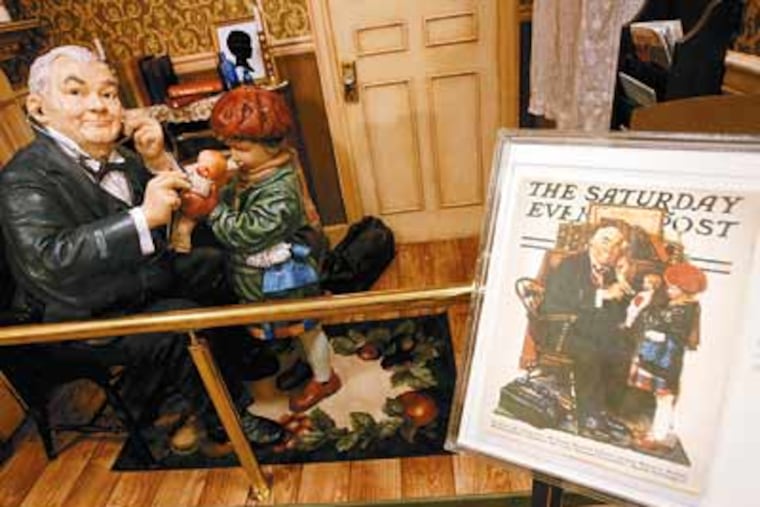 “The Doctor and the Doll,” a 1929 Norman Rockwell work, is recast in three dimensions for the exhibit, which runs at the King of Prussia mall until March 14. (Charles Fox / Staff Photographer)