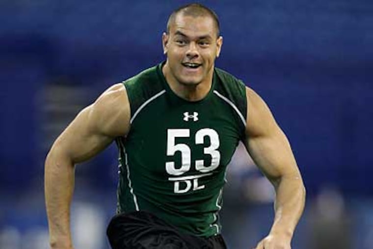 The Eagles signed former Washington DE Daniel Te'o-Nesheim, their third-round pick. (AP Photo/Michael Conroy)