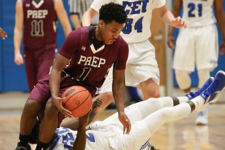 St. Joseph’s Prep’s Kyle Thompson grabs the loose ball from Conwell-Egan’s Daniel Green during the 2nd quarter in Fairless Hill, Friday, February 5, 2016.