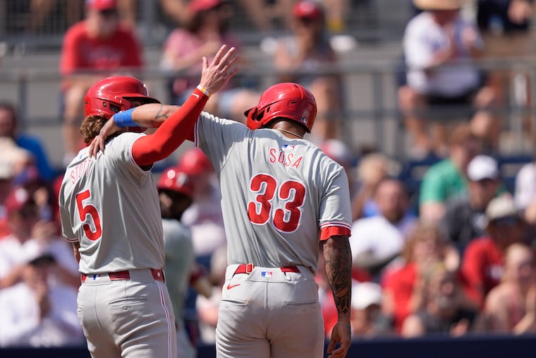The Phillies' Bryson Stott (left) hit his first home run of the spring Friday against the Houston Astros.