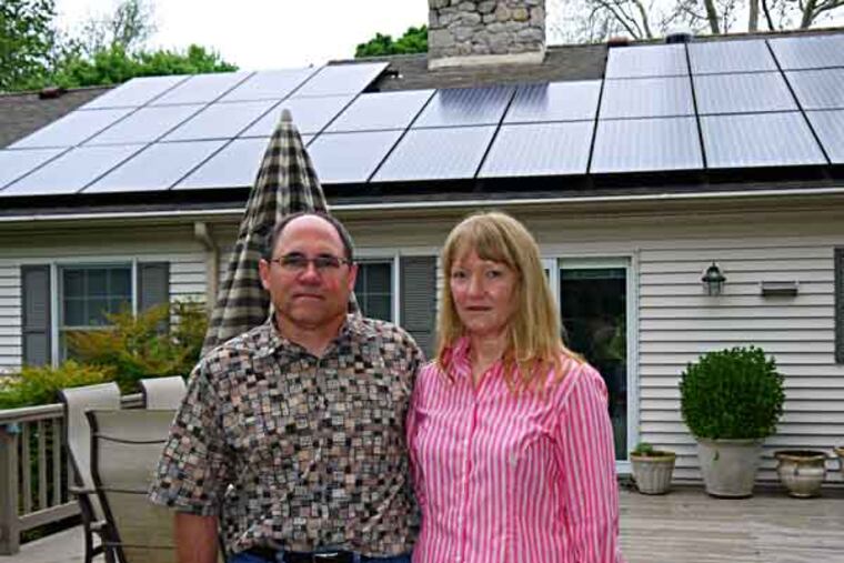 Mari and Arthur Jensen have fought a 19-month battle at the Public Utility Commission with Peco Energy Co. over the method by which the utility pays customers with solar panels for the power they sell back to the grid. In the end, the PUC agreed with the Jensens and forced Peco to compensate 540 customers for not paying them enough for the power they generated. Mari Jensen said they fought the issue on principal, not for the money. The Jensen’s take: $1.42. ( Andrew Maykuth / Staff Photographer )